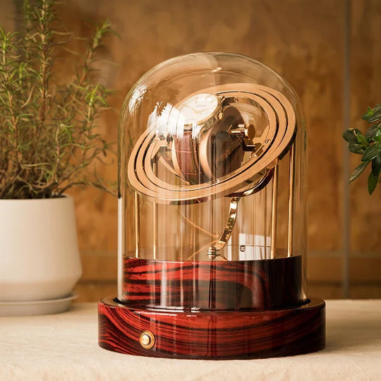 Remontoir de montre Cosmos ruby - cloche de verre pour montre automatique